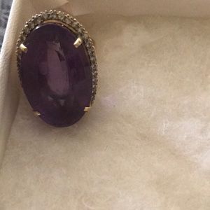 Large Amethyst ring with pave in diamonds.